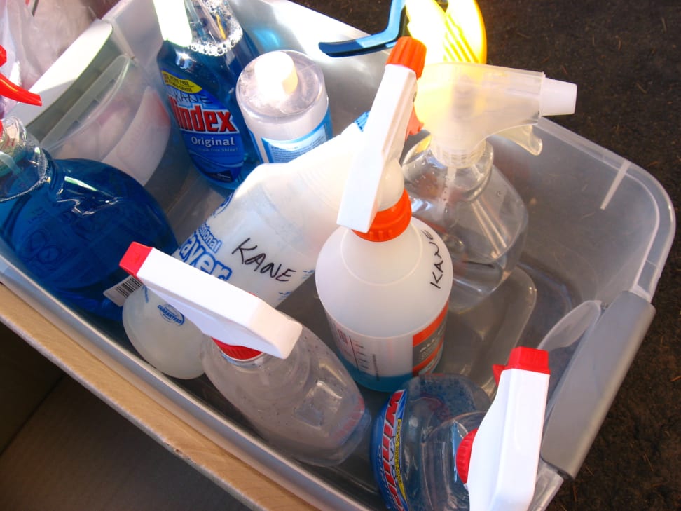 A tub of cleaning supplies