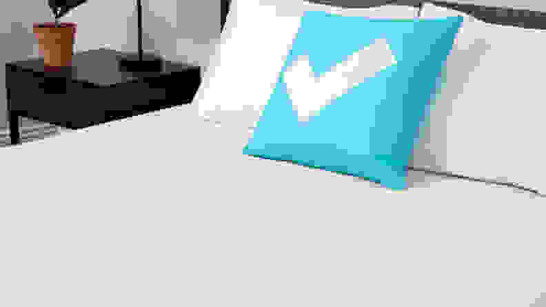 Mattress with blue pillow