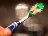 An old toothbrush that needs to be replaced