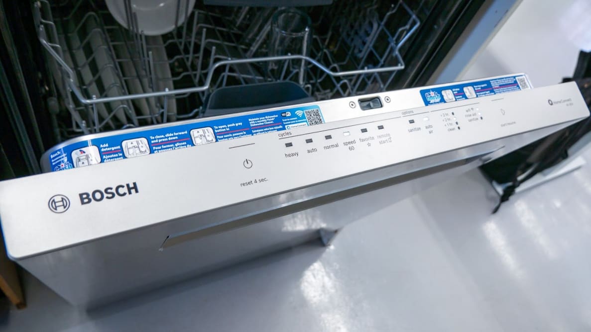 A close-up of the Bosch 500 Series SHP65CM5N dishwasher's top-facing control panel.