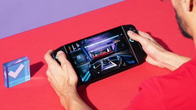 The Lenovo Legion Go with its game library menu on its screen.