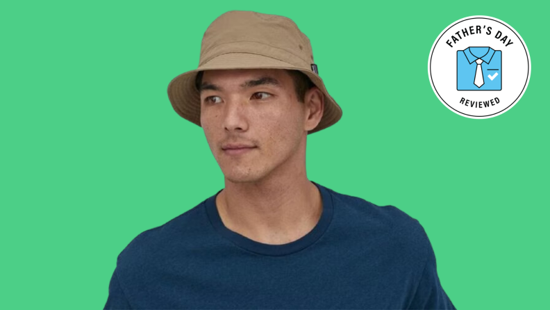 An Asian man wearing a Patagonia hat