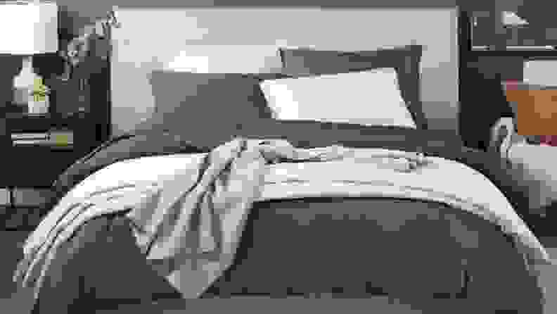 A set of Casper Hyperlite sheets on a bed.