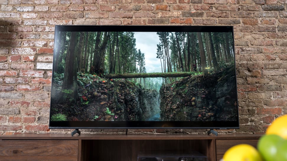 The Samsung Q60A QLED TV displaying 4K/HDR content in a living room setting