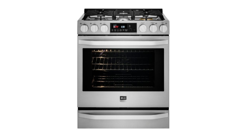 The front of the LG Studio gas range in stainless steel finish. The range has a five-burner gas cooktop and a gas convection oven.