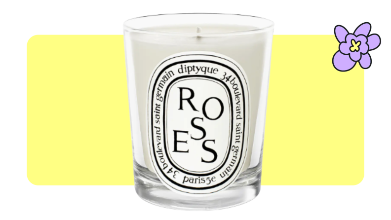A full Diptyque rose-scented candle with a black and white label on front.
