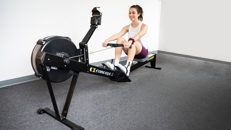 Women exercising on concept2 rowerg.