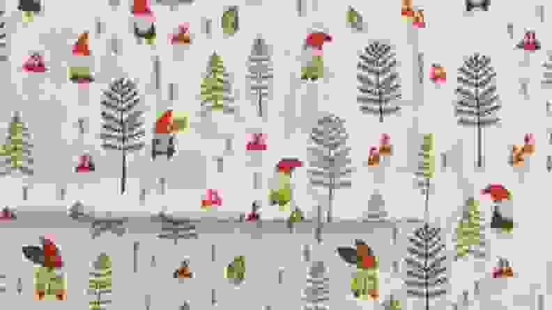 a set of flannel sheets from cuddl duds featuring gnomes and trees