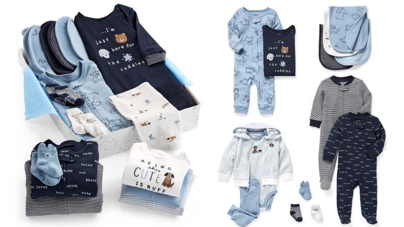 A collection of blue and white baby clothes
