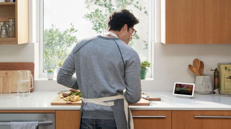 Google Nest Hub on kitchen counter streaming video from YouTube