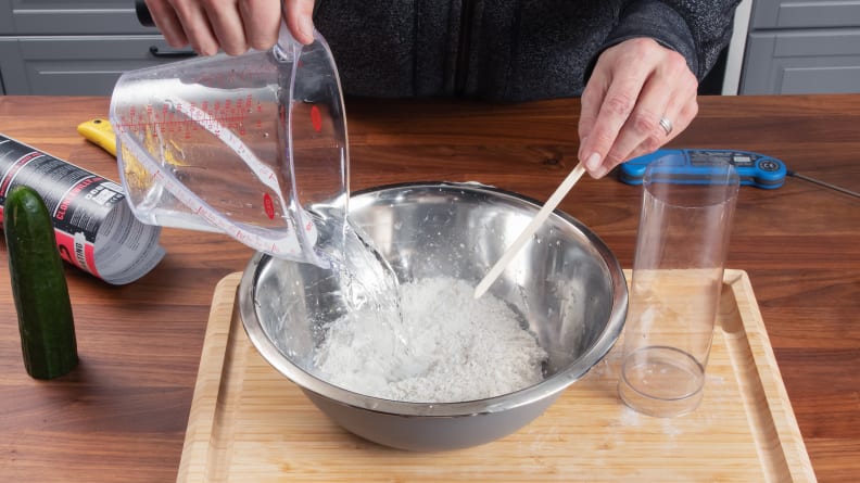 Man mixing ingredients for a DIY dildo.