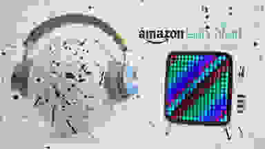 grey background with tablet and headphones on speckled ball that reads "Amazon launchpad"