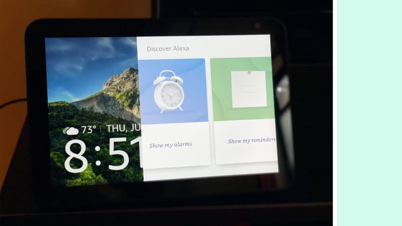 The Echo Show 8's home screen with alerts and reminders.