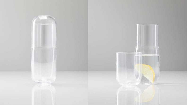 A glass water carafe and stackable water glass. On the left, the glass is stacked on top of the carafe. On the right the glass is next to the carage.