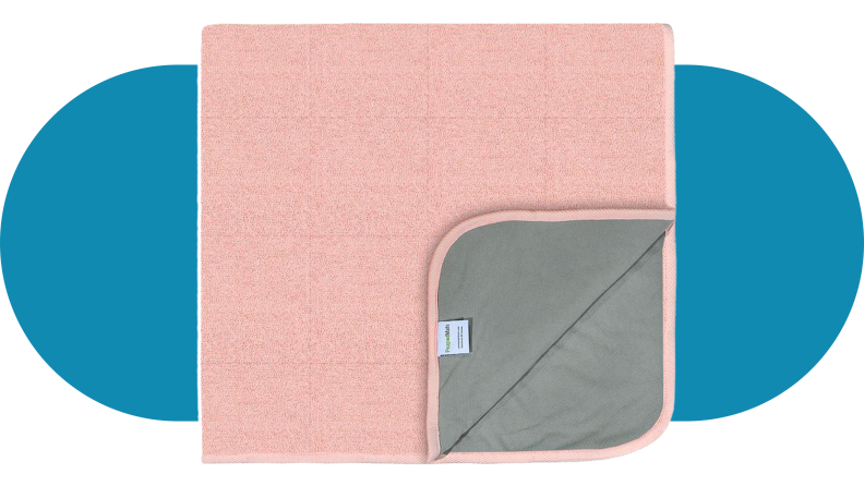 Product shot of pink Peapod bedwetting mat.