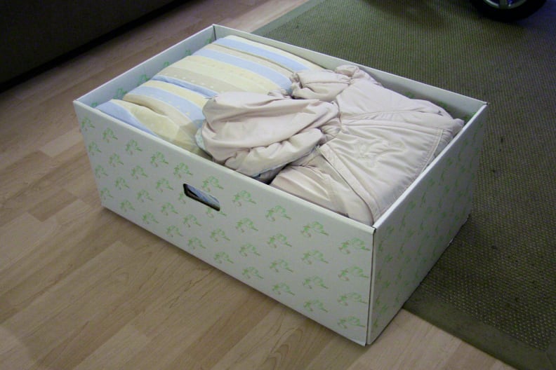 The box itself comes equipped with a waterproof mattress and doubles as a temporary crib.