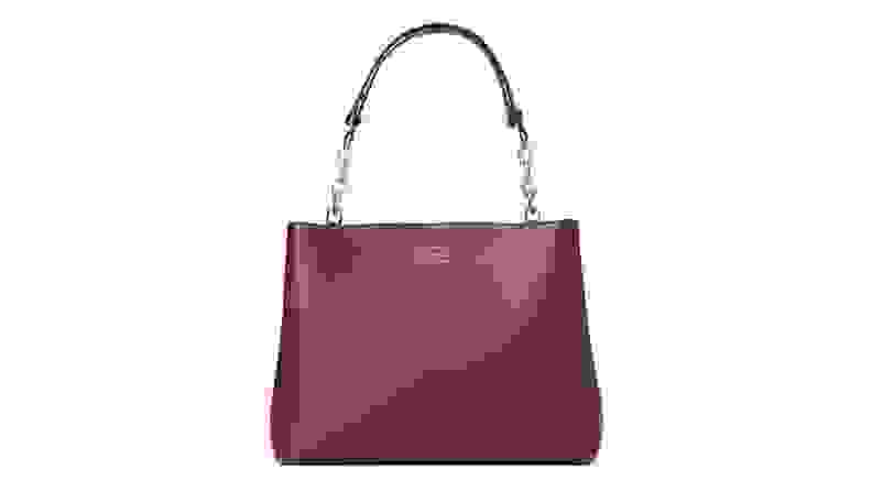 Burgundy colored leather purse from Kate Spade