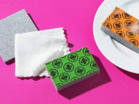Product shot of multicolored Skura sponges and microfiber cloths.