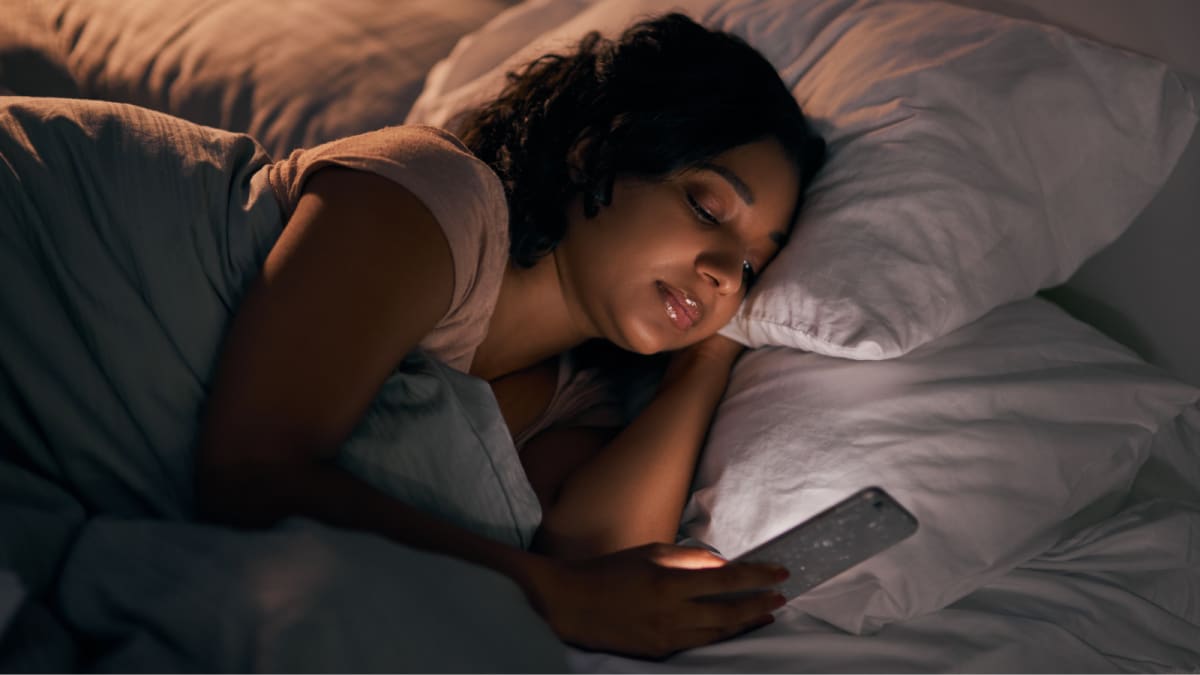 3 in 5 people sleep with their phones near their bed—here's why that's so bad