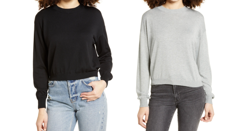 An image of the same sweater in black and grey on the same model.