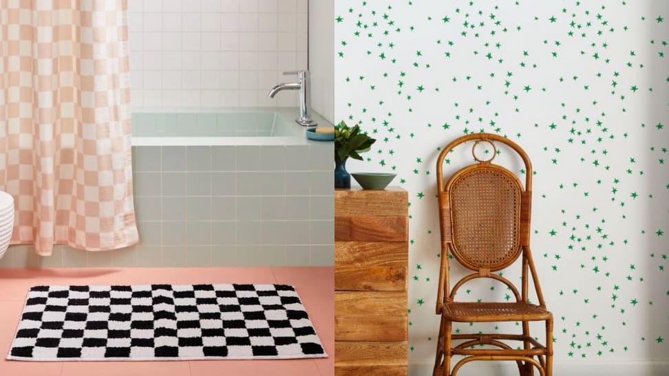 On left, black and white checkerboard bathmat in front of blue tiled retro bath tub. On left, white and green star wallpaper behind brown rattan chair.