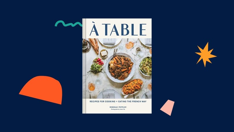 À Table cookbook against a dark blue background.
