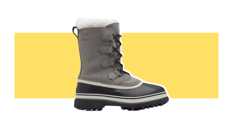 A lace-up gray snow boot with shearling lining.