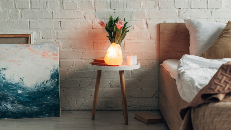 a traditional Himalayan salt lamp makes a cozy bedroom