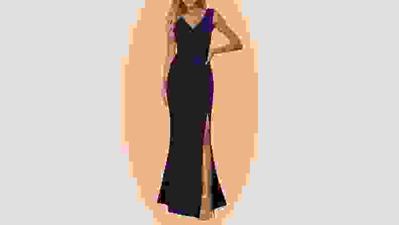 A classic black fitted gown with slit.