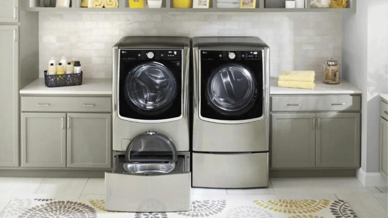 A washer and dryer set sit in a laundry room