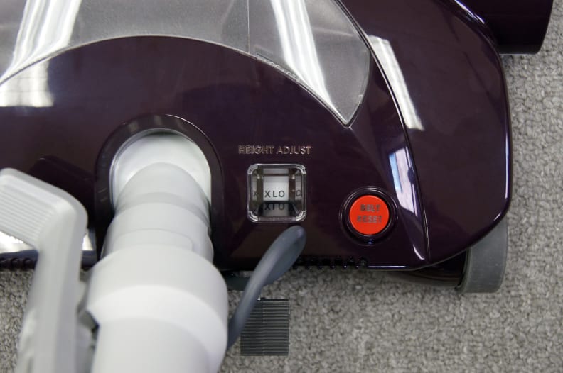 A pedal controls the height of the power brush.