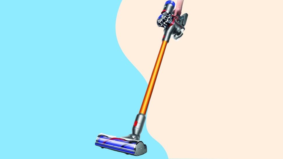 A Dyson V8 Absolute in front of a sky blue and beige background.
