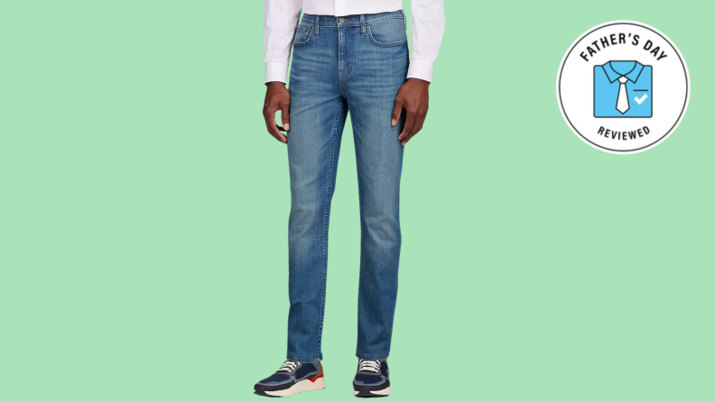 medium wash men's jeans on lime green background