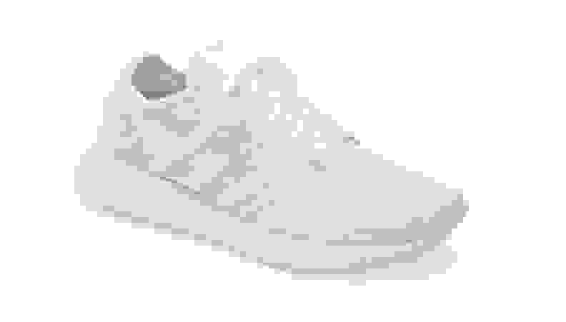 A white Adidas sneaker against a white background.