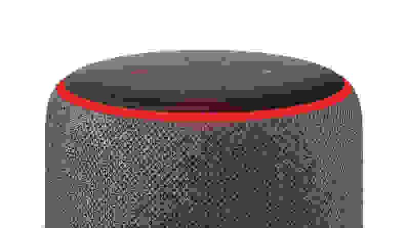 The top of an Amazon Echo speaker with the red light ring illuminated