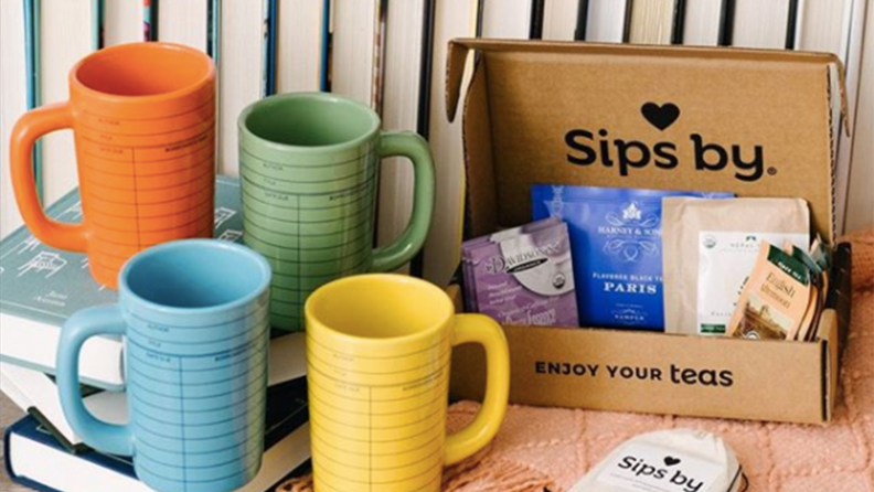 A box of tea and mugs