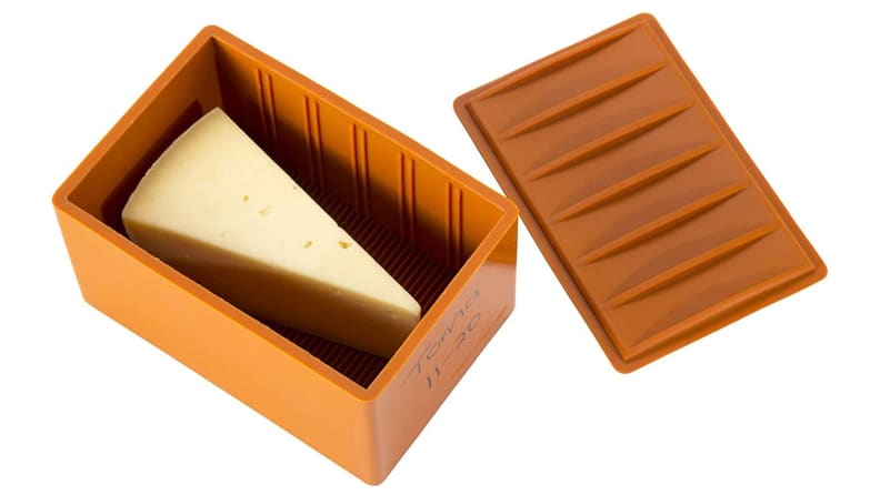 A large wedge of cheese is shown being stored in Capabunga's silicone Cheese Vault.