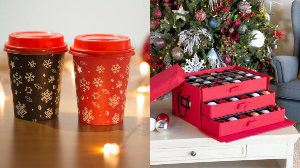On left, two red and black holiday themed disposable coffee cups. On right, red ornament organizer on top of table.