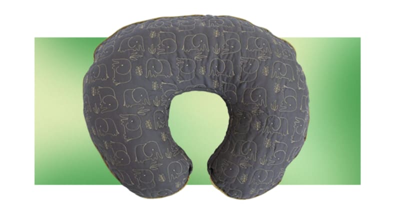 A dark grey Boppy with elephants on it