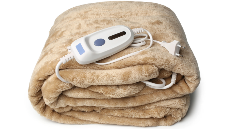 A tan heated blanket with a remote.