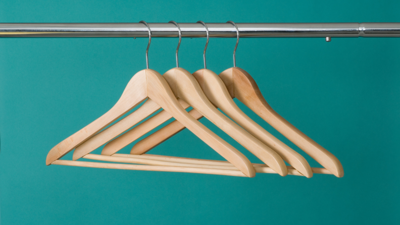 Wooden hangers are sturdy enough for heavyweight garments.