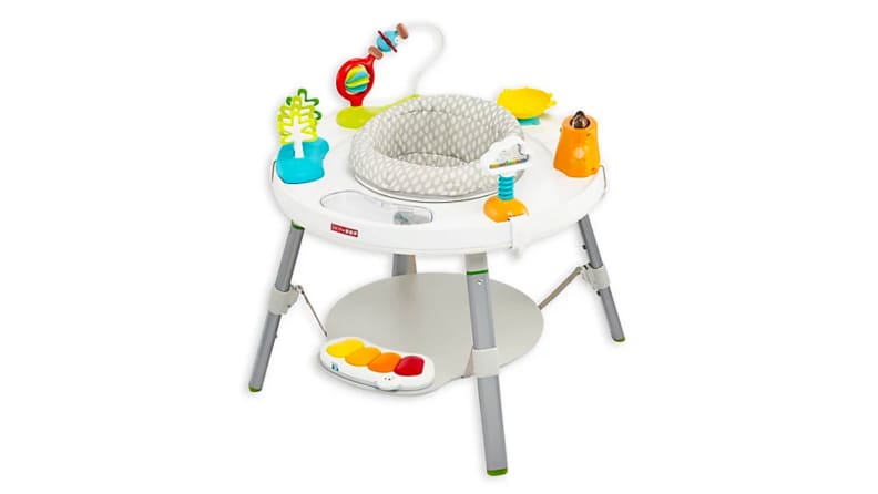 An image of a play seat with a tray with toys, tactile activities, and a bouncing seat.