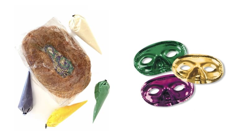 On left, a bagged King cake, unfrosted, with bags of frosting surrounding it. On right, a green, gold, and purple festive eye mask.