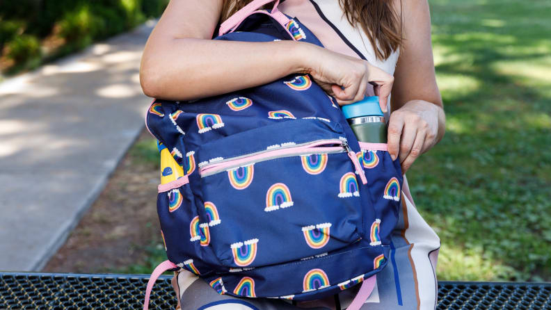 A navy rainbow backpack