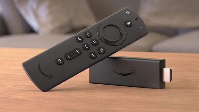 Fire stick and remote lying on wooden table