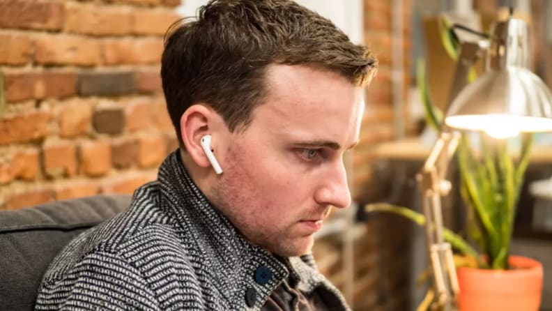 Why people wearing Apple AirPods upside down - Reviewed