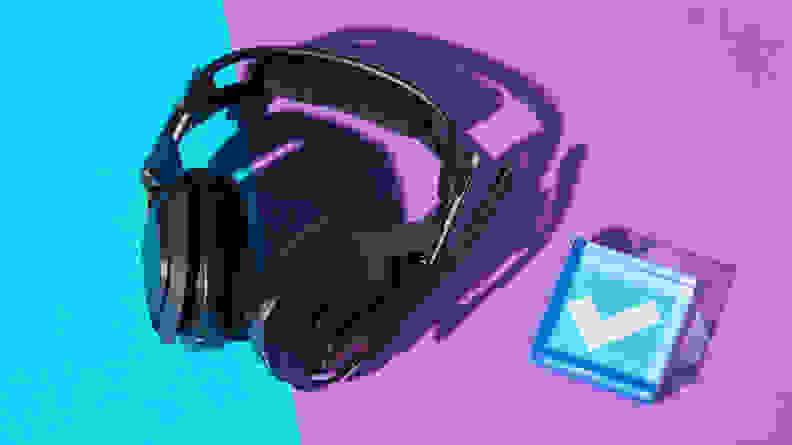 A pair of Logitech Astro A50 X gaming headphones against a split purple and blue backdrop