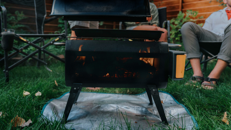You can use either charcoal or firewood to generate heat.