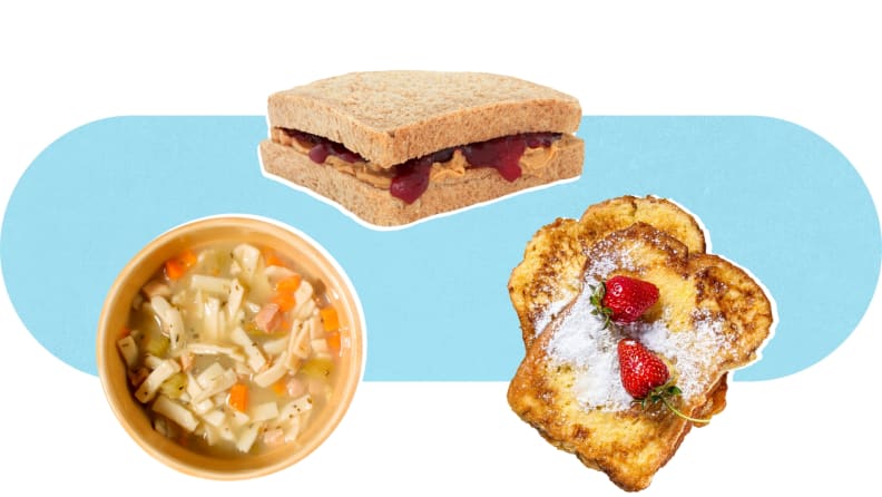 A bowl of chicken noodle soup, a peanut butter and jelly sandwich, and french toast with strawberries on top