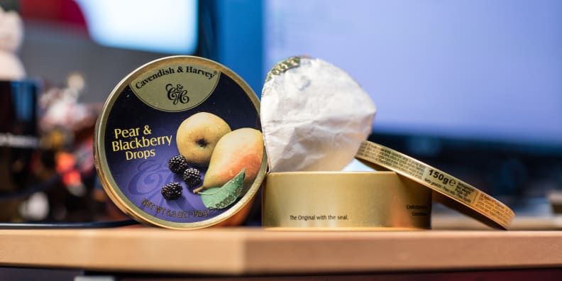 Tasty candies in a beautiful tin
